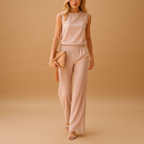 Women’s chic wide leg jumpsuit with round neckline and mid-waist fit, available in multiple colors, perfect for work, evenings, and special occasions.