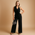 Women’s chic wrap jumpsuit with tailored waist and wide-leg silhouette, available in classic colors, perfect for formal and business occasions.