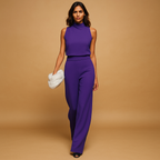 Women’s elegant halter jumpsuit with wide legs, high waist, and decorative bow, perfect for parties, dinners, and festive occasions.