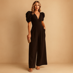 Women’s elegant long jumpsuit with a tailored waist and flowing silhouette, available in multiple colors, perfect for galas, dinners, and formal occasions.