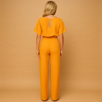 Women’s high waist jumpsuit with lace-up detail and flattering fit, available in multiple colors, perfect for work, evenings, and chic occasions.