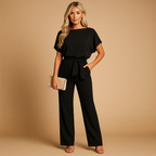 Women’s high waist jumpsuit with lace-up detail and flattering fit, available in multiple colors, perfect for work, evenings, and chic occasions.