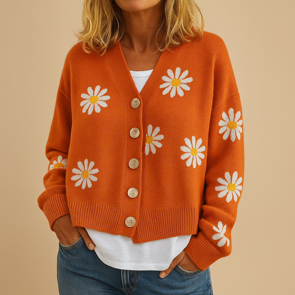 Women’s knitted cardigan with button closure and elegant floral pattern, designed for autumn and winter layering in casual or refined outfits.