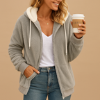 Women’s long fleece cardigan with hood in a relaxed fit, perfect for autumn and winter layering or cozy lounging at home.
