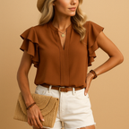 Women’s sleeveless blouse with refined cut and lightweight fabric, perfect for work, evenings out, or casual elegant outfits.