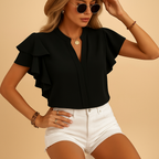 Women’s sleeveless blouse with refined cut and lightweight fabric, perfect for work, evenings out, or casual elegant outfits.