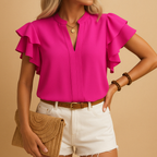 Women’s sleeveless blouse with refined cut and lightweight fabric, perfect for work, evenings out, or casual elegant outfits.
