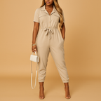 Women’s tailored jumpsuit with button closure and flattering slim fit, perfect for work, brunch, or evening occasions.