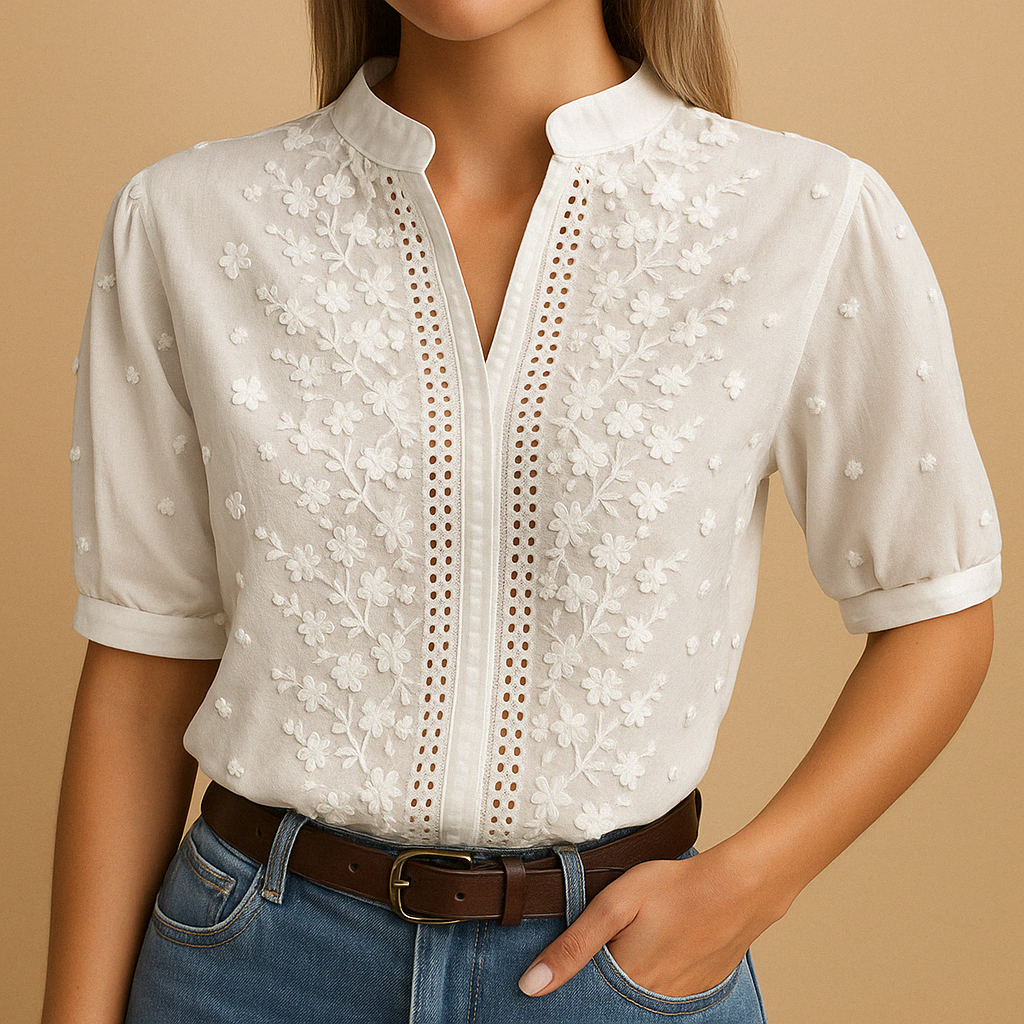 Women’s white blouse with classic collar, button closure, and light tailored fit, perfect for work, casual days, and evenings out.