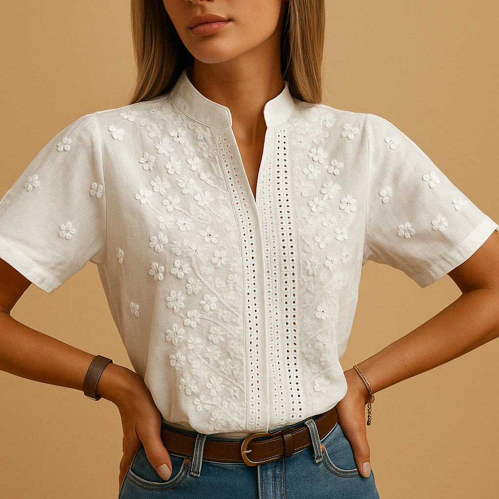 Women’s white blouse with classic collar, button closure, and light tailored fit, perfect for work, casual days, and evenings out.