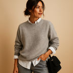 Women’s wool knit sweater with elegant fit and minimalist design, perfect for casual wear or semi-formal occasions.