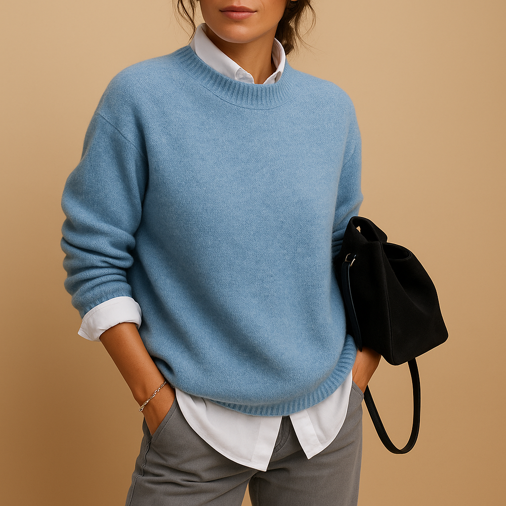 Women’s wool knit sweater with elegant fit and minimalist design, perfect for casual wear or semi-formal occasions.