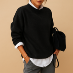 Women’s wool knit sweater with elegant fit and minimalist design, perfect for casual wear or semi-formal occasions.